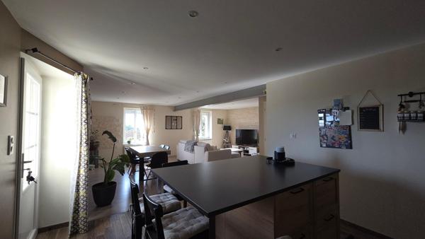 Immeuble de caractère en centre-ville : appartement rénové, local commercial et vaste potentiel à exploiter