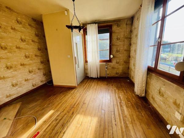 Maison individuelle sur sous-sol avec jardin