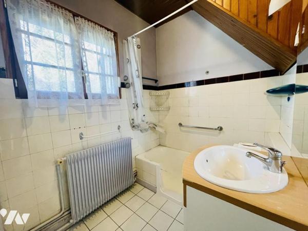 Maison individuelle sur sous-sol avec jardin