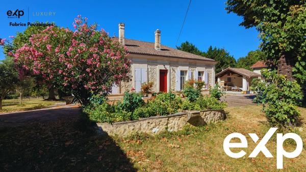 Maison de caractère avec appartement indépendant et jardin soigné