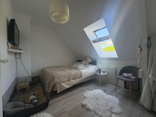 Maison située en bourg, à proximité d'Angers