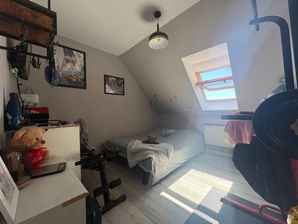 Maison située en bourg, à proximité d'Angers