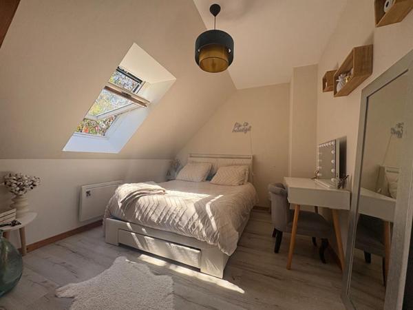 Maison située en bourg, à proximité d'Angers