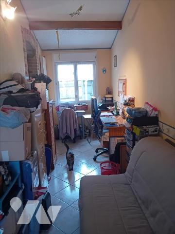 Changé, maison de bourg en coeur de village.