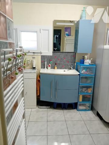 Changé, maison de bourg en coeur de village.