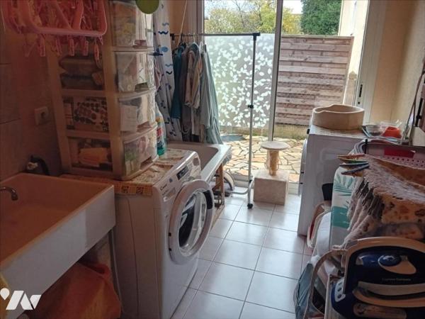 Changé, maison de bourg en coeur de village.