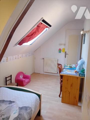 Changé, maison de bourg en coeur de village.