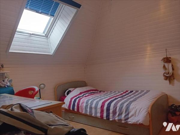 Changé, maison de bourg en coeur de village.