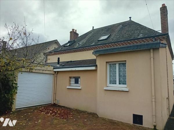 Changé, maison de bourg en coeur de village.