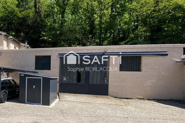 MAISON INDIVIDUELLE SANS VIS A VIS AVEC TERRAIN ET HANGAR