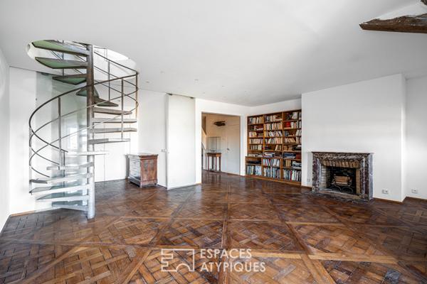 Un duplex à réinventer avec vue sur l’emblématique Place des Vosges