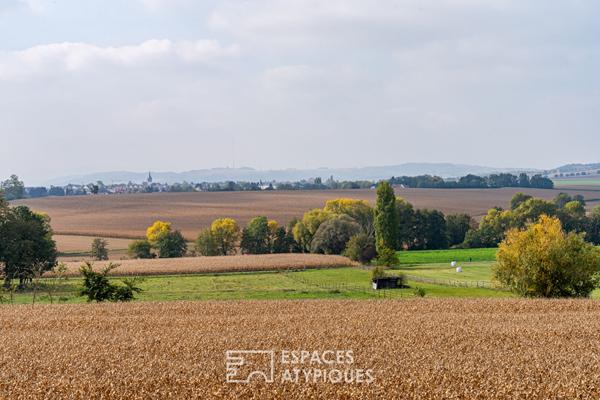 Triplex avec jardin et vue dégagée