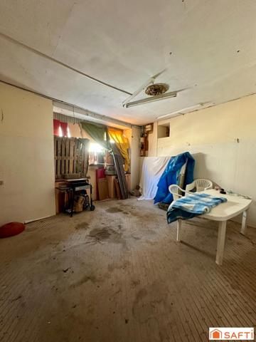 Maison de bourg avec 3 chambres, cave et dépendance