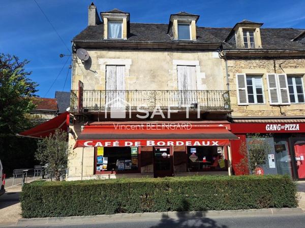 Immeuble de rapport comportant un local commercial et appartement T4