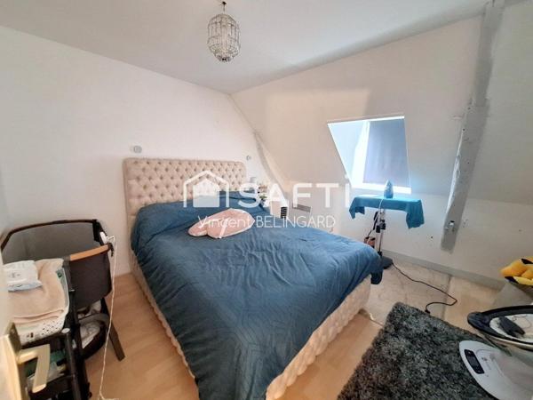 Immeuble de rapport comportant un local commercial et appartement T4