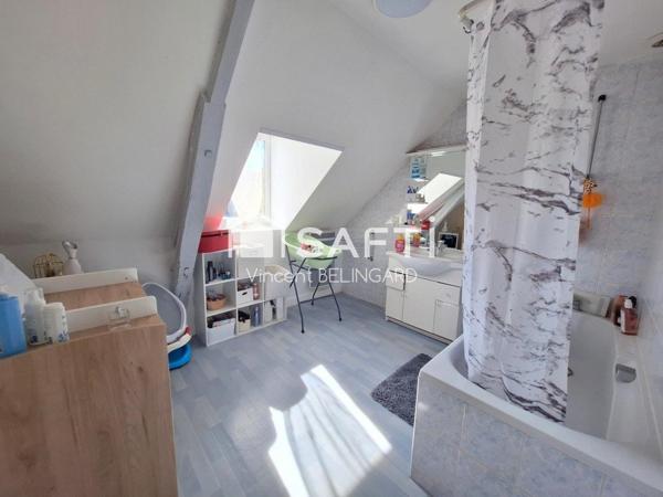 Immeuble de rapport comportant un local commercial et appartement T4