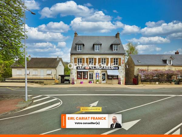 DEUX APPARTEMENTS SUR 154 M² ET COMMERCE DE 100 M², L’ENSEMBLE SUR 574 M² DE TERRAIN CLOS :