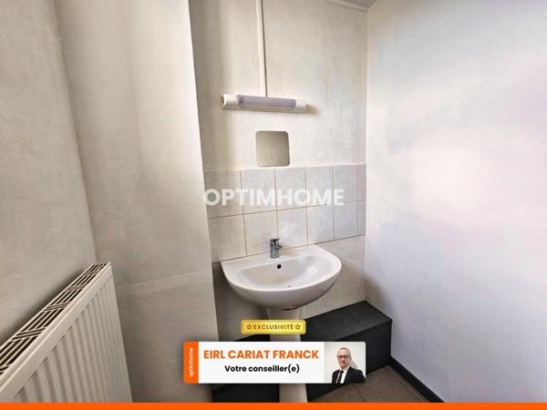 DEUX APPARTEMENTS SUR 154 M² ET COMMERCE DE 100 M², L’ENSEMBLE SUR 574 M² DE TERRAIN CLOS :