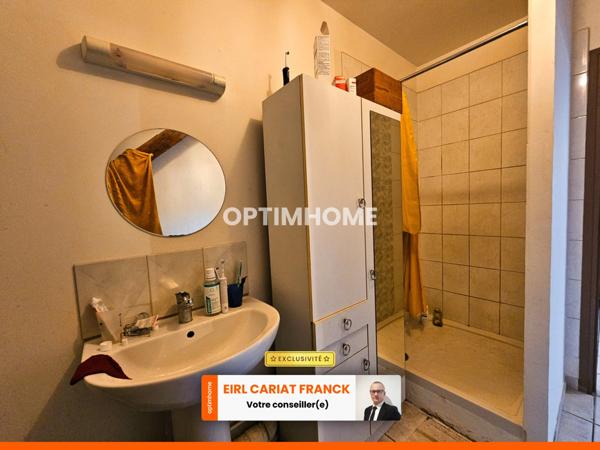 DEUX APPARTEMENTS SUR 154 M² ET COMMERCE DE 100 M², L’ENSEMBLE SUR 574 M² DE TERRAIN CLOS :