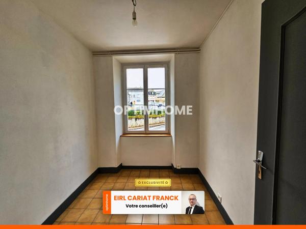 DEUX APPARTEMENTS SUR 154 M² ET COMMERCE DE 100 M², L’ENSEMBLE SUR 574 M² DE TERRAIN CLOS :