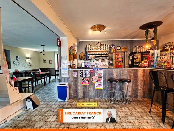 DEUX APPARTEMENTS SUR 154 M² ET COMMERCE DE 100 M², L’ENSEMBLE SUR 574 M² DE TERRAIN CLOS :