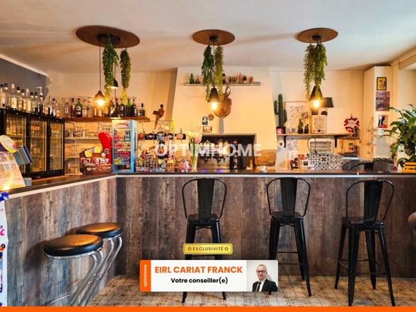 DEUX APPARTEMENTS SUR 154 M² ET COMMERCE DE 100 M², L’ENSEMBLE SUR 574 M² DE TERRAIN CLOS :