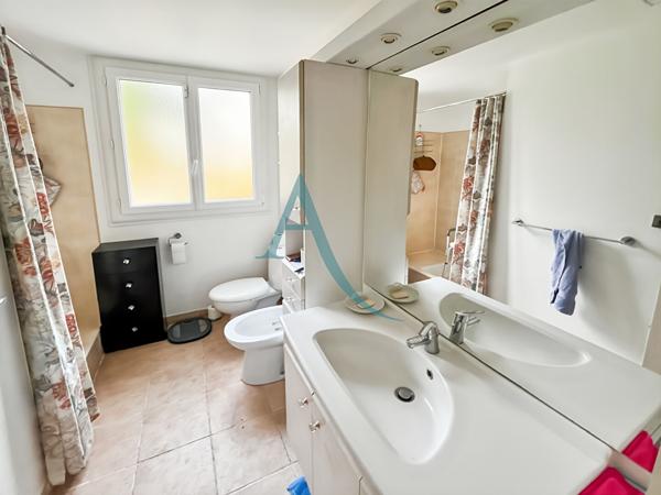 Maison modèle AMBOISE I village Levitt vue espace vert