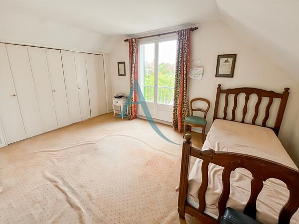 Maison modèle AMBOISE I village Levitt vue espace vert