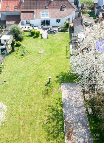 MANIHEN : LONGÈRE RÉNOVÉE en SEMI-PLAIN-PIED SOUS SOL GARAGE. Outreau (62230)