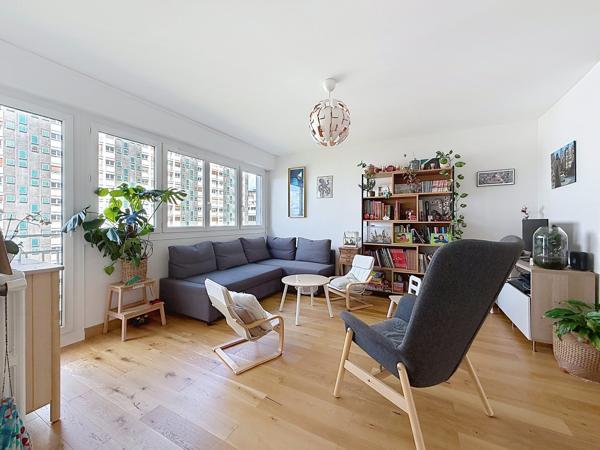 Appartement familial traversant avec garage – Quartier Colombier