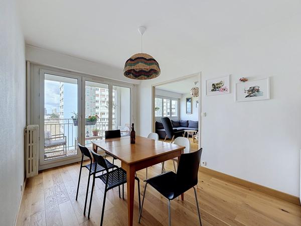 Appartement familial traversant avec garage – Quartier Colombier