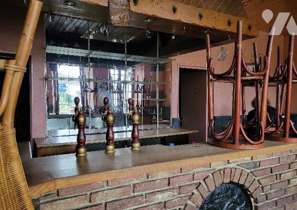 un immeuble en copropriété, sis à FUMAY (Ardennes), près le passage à niveau et la gare