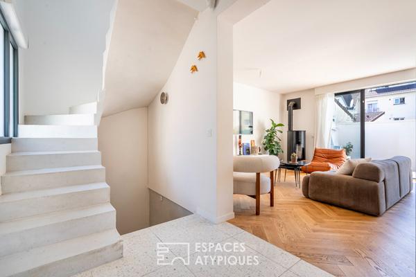 Maison d’architecte avec terrasses et couloir de nage