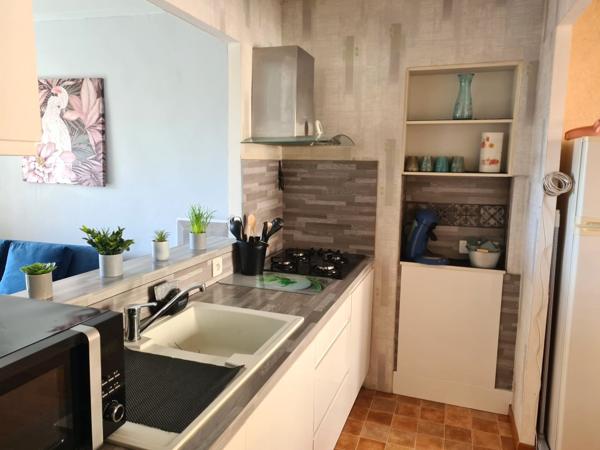 Immeuble de rapport - 2 appartements et 2 commerces