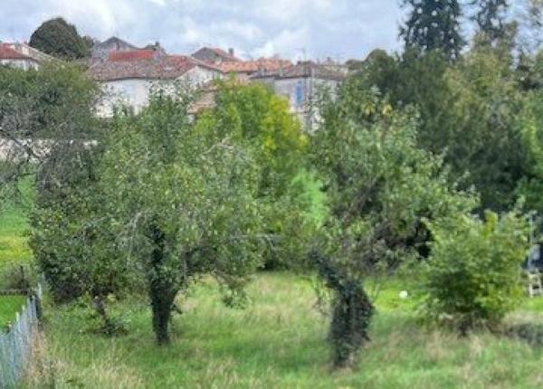 Garage avec terrain constructible