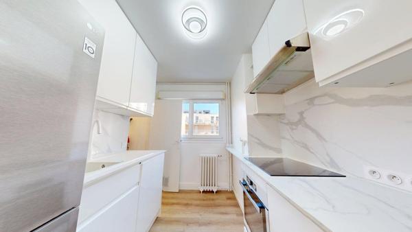 Appartement rénové avec garage, cave et ascenseur - Quartier recherché