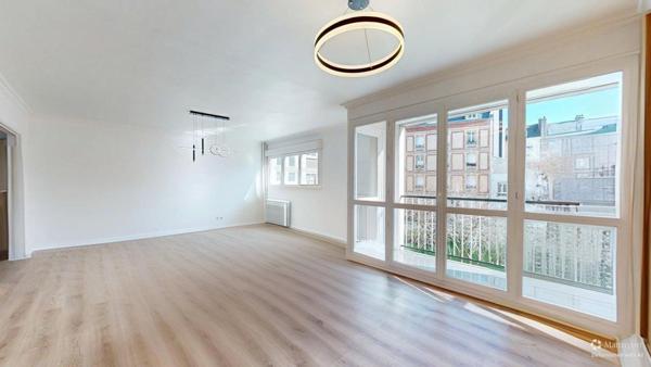 Appartement rénové avec garage, cave et ascenseur - Quartier recherché