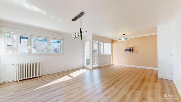 Appartement rénové avec garage, cave et ascenseur - Quartier recherché