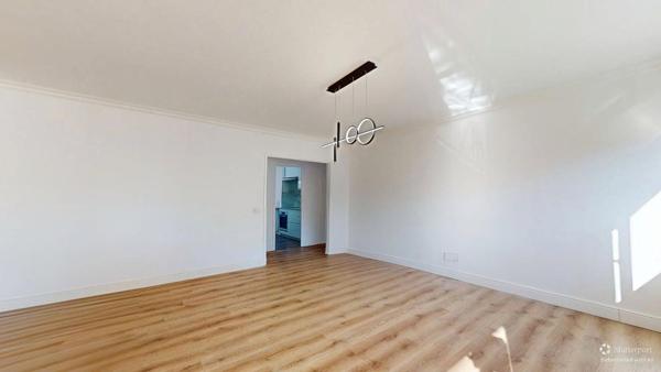 Appartement rénové avec garage, cave et ascenseur - Quartier recherché