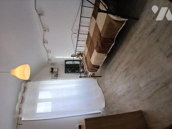 UNE MAISON D'HABITATION dans village calme