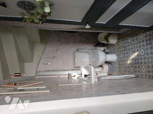 UNE MAISON D'HABITATION dans village calme