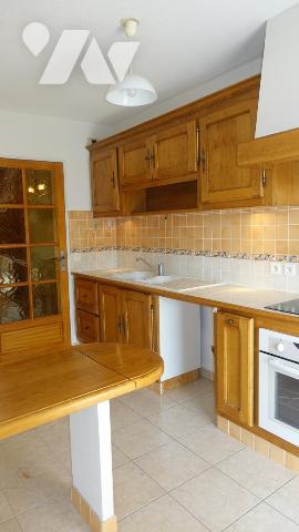 Appartement 3 pièces avec terrasse, garage et vue dégagée – Résidence sécurisée avec ascenseur