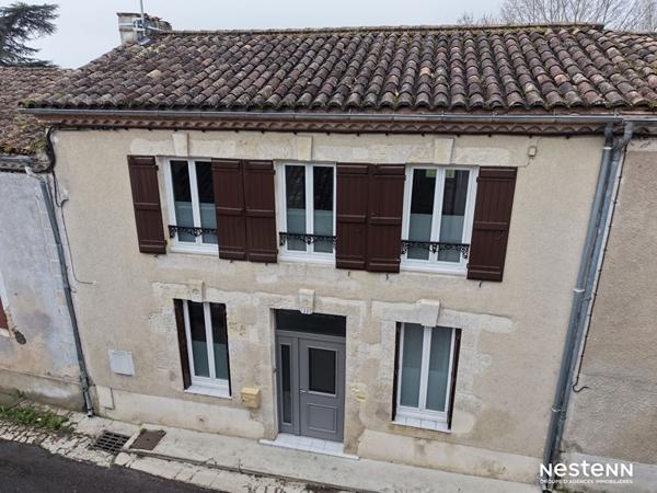 A Vendre Maison en pierre rénovée de 86 m² avec jardin et dépendances au coeur de Mézin