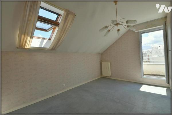 LE RHEU T4 DUPLEX EN CENTRE VILLE AVEC GARAGE ET BALCONS