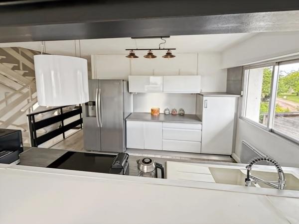 Maison de ville de 106,9 M² avec bel espace de vie, 3 chambres, terrasse et véranda au cœur de Granville !