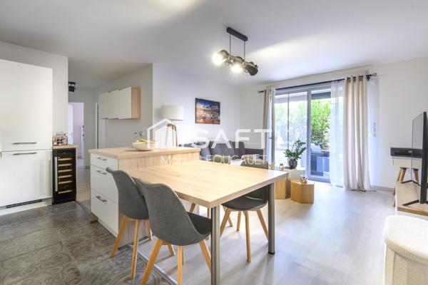 Appartement 3 pièces de 61 m2 en rez de jardin avec sa terrasse de 22 m2, son jardin de 100 m2 et son garage fermé