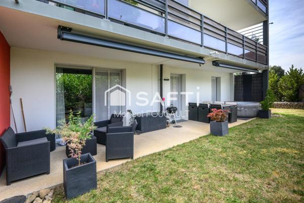 Appartement 3 pièces de 61 m2 en rez de jardin avec sa terrasse de 22 m2, son jardin de 100 m2 et son garage fermé
