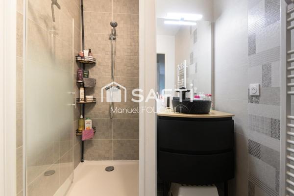 Appartement 3 pièces de 61 m2 en rez de jardin avec sa terrasse de 22 m2, son jardin de 100 m2 et son garage fermé