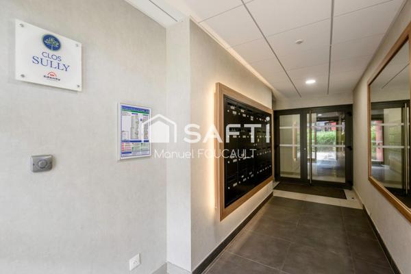Appartement 3 pièces de 61 m2 en rez de jardin avec sa terrasse de 22 m2, son jardin de 100 m2 et son garage fermé