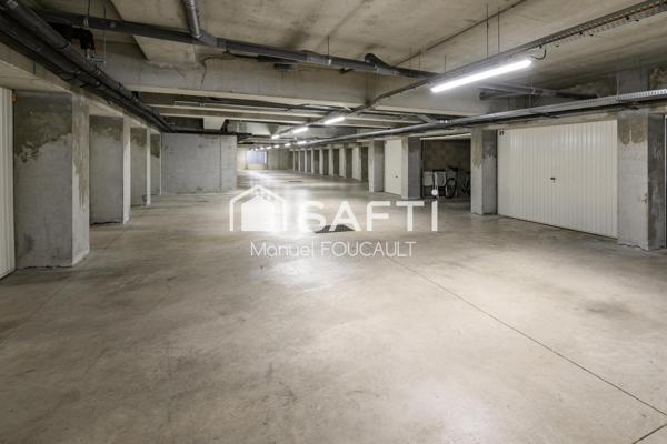 Appartement 3 pièces de 61 m2 en rez de jardin avec sa terrasse de 22 m2, son jardin de 100 m2 et son garage fermé